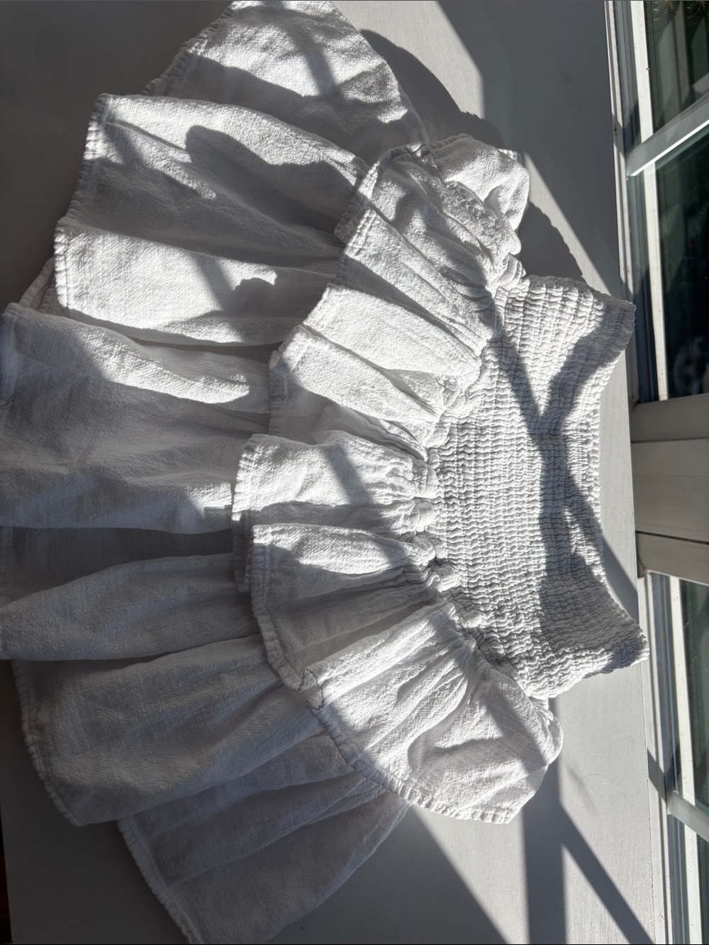 White Smocked Ruffled skirt with built in shorts worn once